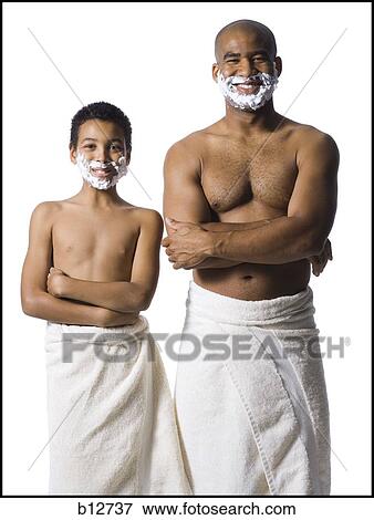 Father and son shaving together View Large Photo Image Stock Photo - Father and son shaving together. Fotosearch