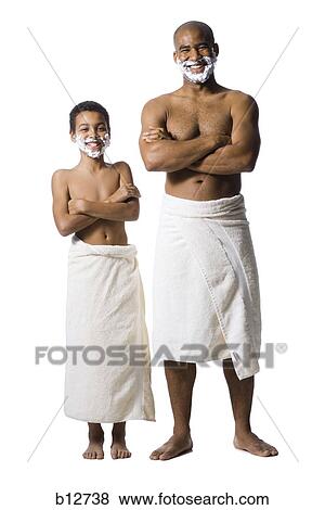 Stock Photo - Father and son shaving together. Fotosearch
