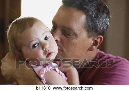 Stock Image - Father and young daughter. Fotosearch