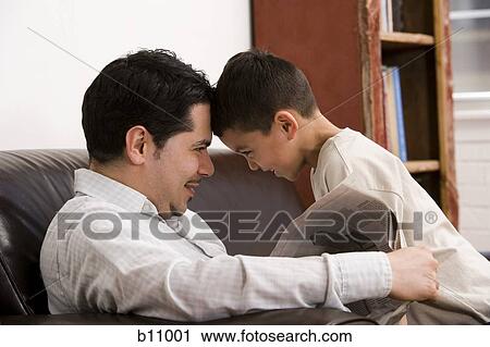 Father and young son playing View Large Photo Image Stock Image - Father and young son playing. Fotosearch