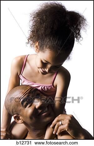 Father holding young daughter View Large Photo Image Stock Image - Father holding young daughter. Fotosearch