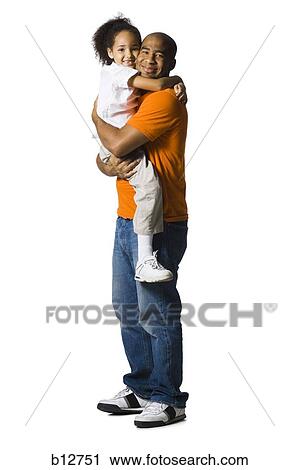 Stock Image - Father holding young daughter. Fotosearch