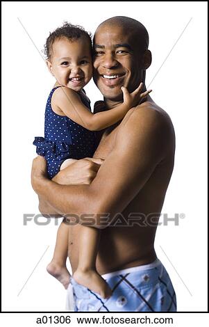 Father holding young daughter View Large Photo Image Stock Photograph - Father holding young daughter. Fotosearch