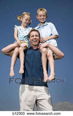Father playing with son and daughter View Large Photo Image Stock Image - Father playing with son and daughter. Fotosearch