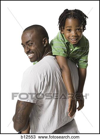 Father playing with young son View Large Photo Image Stock Image - Father playing with young son. Fotosearch