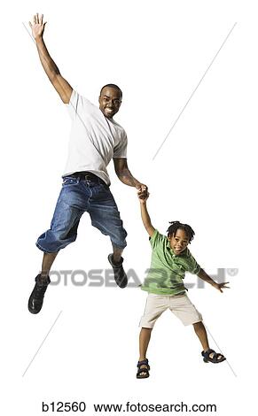Father playing with young son View Large Photo Image Stock Image - Father playing with young son. Fotosearch