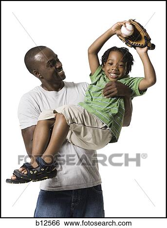 Father playing with young son View Large Photo Image Stock Photograph - Father playing with young son. Fotosearch