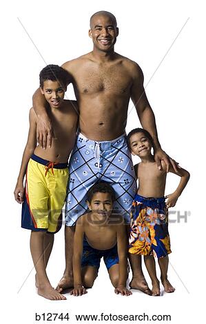 Father posing with three sons View Large Photo Image Picture - Father posing with three sons. Fotosearch