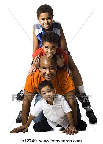 Stock Photo - Father posing with three sons. Fotosearch