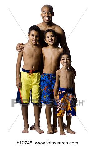 Stock Photography - Father posing with three sons. Fotosearch