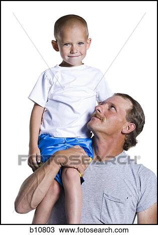 Father with son sitting on shoulder View Large Photo Image Stock Image - Father with son sitting on shoulder. Fotosearch