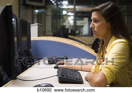 Female college student doing internet research View Large Photo Image Stock Image - Female college student doing internet research. Fotosearch