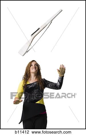 Female color guard twirling rifle View Large Photo Image Stock Image - Female color guard twirling rifle. Fotosearch