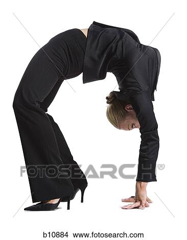 Picture - Female contortionist businesswoman. Fotosearch