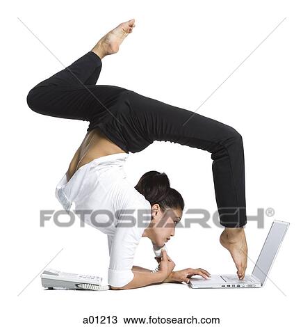 Female contortionist businesswoman View Large Photo Image Stock Image - Female contortionist businesswoman. Fotosearch