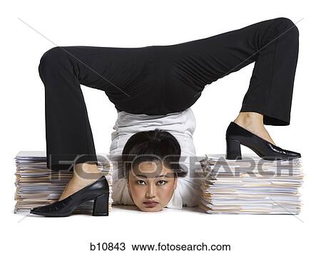 Female contortionist businesswoman View Large Photo Image Stock Image - Female contortionist businesswoman. Fotosearch