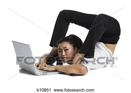 Stock Image - Female contortionist businesswoman. Fotosearch