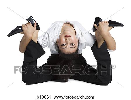 Female contortionist businesswoman View Large Photo Image Stock Image - Female contortionist businesswoman. Fotosearch
