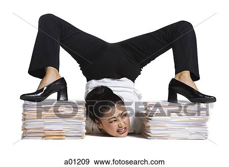 Female contortionist businesswoman View Large Photo Image Stock Photo - Female contortionist businesswoman. Fotosearch
