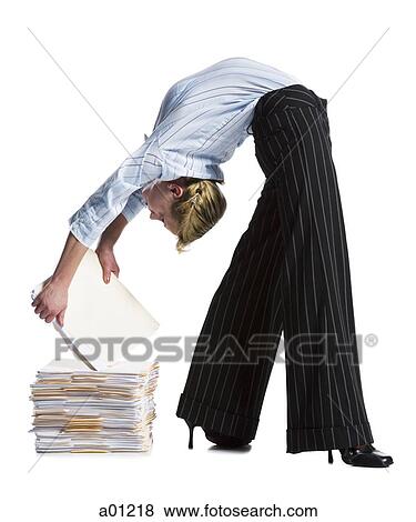 Female contortionist businesswoman bending over backwards View Large Photo Image Stock Photo - Female contortionist businesswoman bending over backwards. Fotosearch