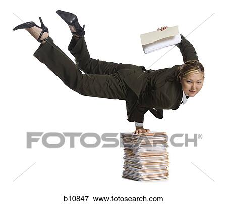 Stock Photo - Female contortionist businesswoman. Fotosearch