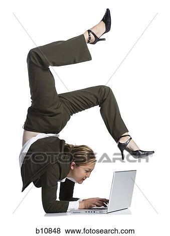 Stock Photo - Female contortionist businesswoman. Fotosearch
