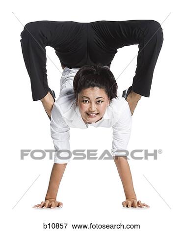 Female contortionist businesswoman View Large Photo Image Stock Photo - Female contortionist businesswoman. Fotosearch