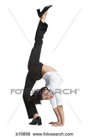 Stock Photo - Female contortionist businesswoman. Fotosearch