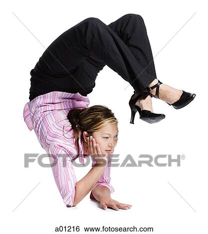 Female contortionist businesswoman View Large Photo Image Stock Photograph - Female contortionist businesswoman. Fotosearch