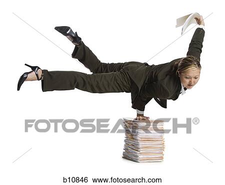 Female contortionist businesswoman View Large Photo Image Stock Photograph - Female contortionist businesswoman. Fotosearch