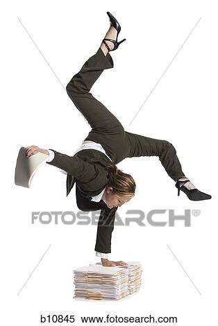 Female contortionist businesswoman View Large Photo Image Stock Photography - Female contortionist businesswoman. Fotosearch