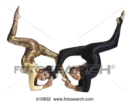 Female contortionist duo performing View Large Photo Image Stock Image - Female contortionist duo performing. Fotosearch