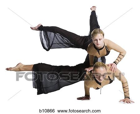Female contortionist duo performing View Large Photo Image Stock Photograph - Female contortionist duo performing. Fotosearch
