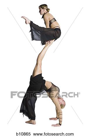 Female contortionist duo performing View Large Photo Image Stock Photography - Female contortionist duo performing. Fotosearch