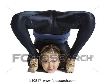 Female contortionist View Large Photo Image Stock Photo - Female contortionist. Fotosearch