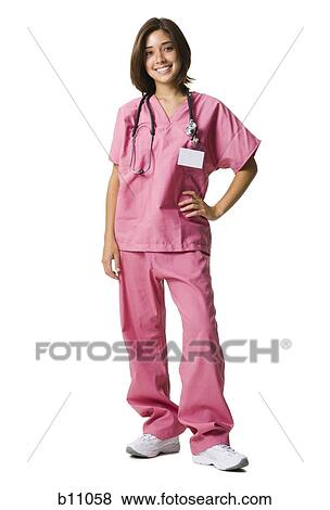 Female doctor in pink scrubs View Large Photo Image Stock Photo - Female doctor in pink scrubs. Fotosearch