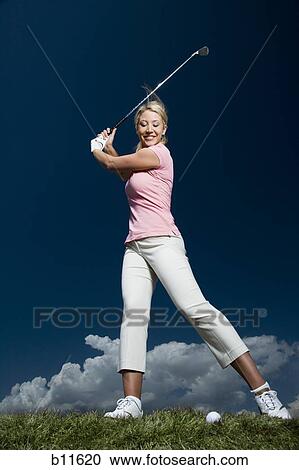 Female golfer View Large Photo Image Stock Image - Female golfer. Fotosearch