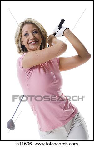 Stock Photograph - Female golfer. Fotosearch