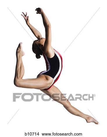 Picture - Female gymnast doing floor exercises. Fotosearch
