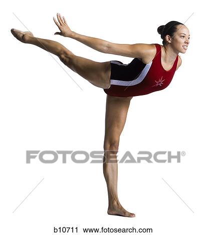Female gymnast doing floor exercises View Large Photo Image Stock Image - Female gymnast doing floor exercises. Fotosearch