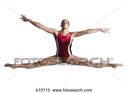 Stock Photography - Female gymnast doing floor exercises. Fotosearch