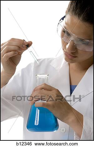 Female lab worker testing and experimenting View Large Photo Image Stock Photograph - Female lab worker testing and experimenting. Fotosearch