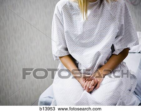 Female patient neck down wringing hands View Large Photo Image Stock Image - Female patient neck down wringing hands. Fotosearch