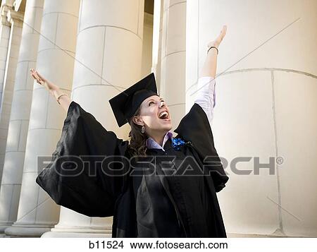 Picture - Female student celebrating graduation. Fotosearch