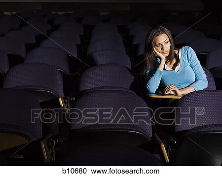 Female student taking notes in lecture hall View Large Photo Image Stock Image - Female student taking notes in lecture hall. Fotosearch