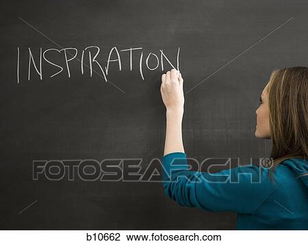 Female student writing word inspiration on chalkboard View Large Photo Image Stock Image - Female student writing word inspiration on chalkboard. Fotosearch