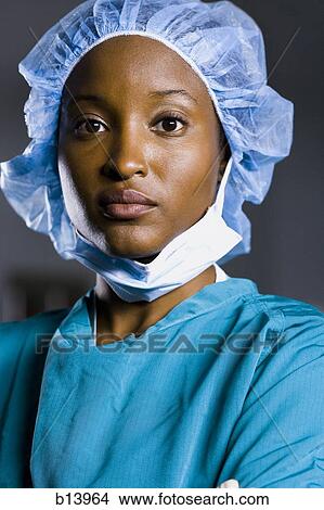 Female surgeon in scrubs View Large Photo Image Picture - Female surgeon in scrubs. Fotosearch