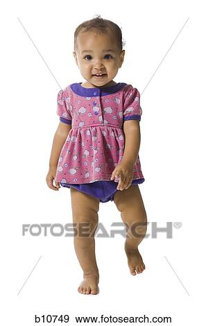 Female toddler walking View Large Photo Image Stock Photo - Female toddler walking. Fotosearch