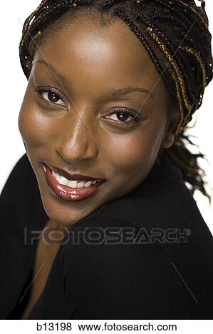 Female with braided hair smiling View Large Photo Image Stock Photo - Female with braided hair smiling. Fotosearch