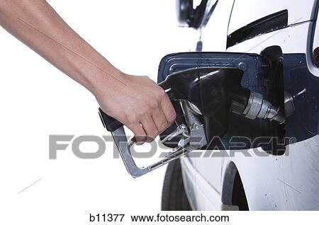 Filling up gas tank View Large Photo Image Stock Photo - Filling up gas tank. Fotosearch